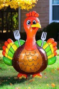 Meet your new Thanksgiving MVP: an inflatable turkey with all the flair, clutching forks like it's ready for a feast. It’s like lawn decor got a sense of humor.