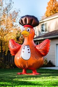 Okay, listen up. This giant inflatable turkey in a chef's hat is the lawn decor you didn't know you needed. It's like Thanksgiving threw a party and forgot to invite subtlety!