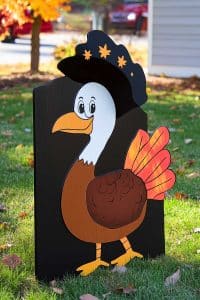 Meet Tom, the most dapper yard turkey you'll ever see. Rocking a pilgrim hat and surrounded by autumn flair, he's gobbling up all the Thanksgiving compliments.