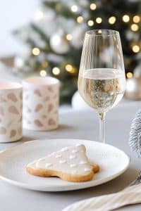 Behold: a Christmas tree cookie so fancy it needs its own plate, chilling with a glass of bubbly and candles. Festive enough yet totally extra.