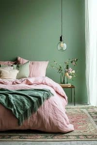 pink_and_sage_bedroom_ideas (29) Think pink petals meet green dreams in this bedroom. A floral sidekick adds charm, while the floating light bulb wonders about gravity.