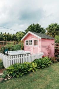 Meet the ultimate backyard getaway: a bubblegum pink shed where garden gnomes throw VIP parties, complete with a hot tub for epic tiny cannonballs.