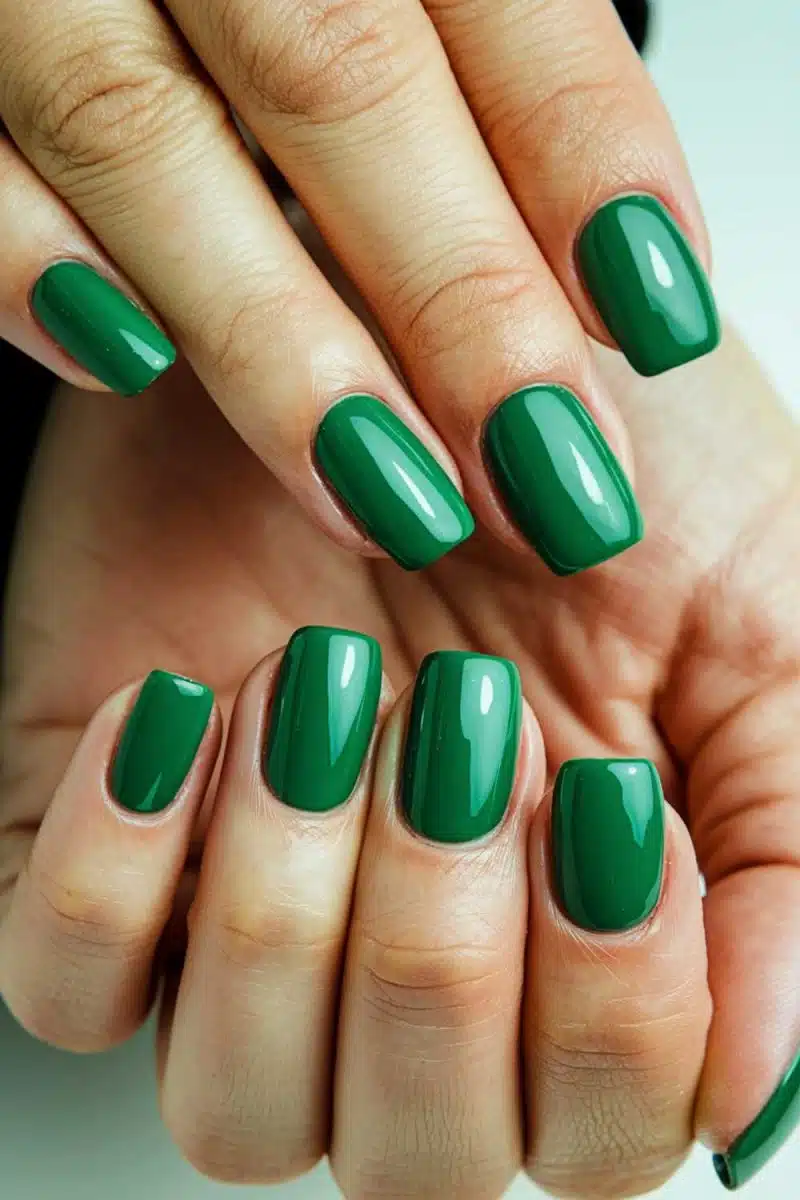 Behold the ultimate nail flex—glossy green squares that say Im too cool for round tips. These nails could haunt sloppy decor choices with a mere tap.