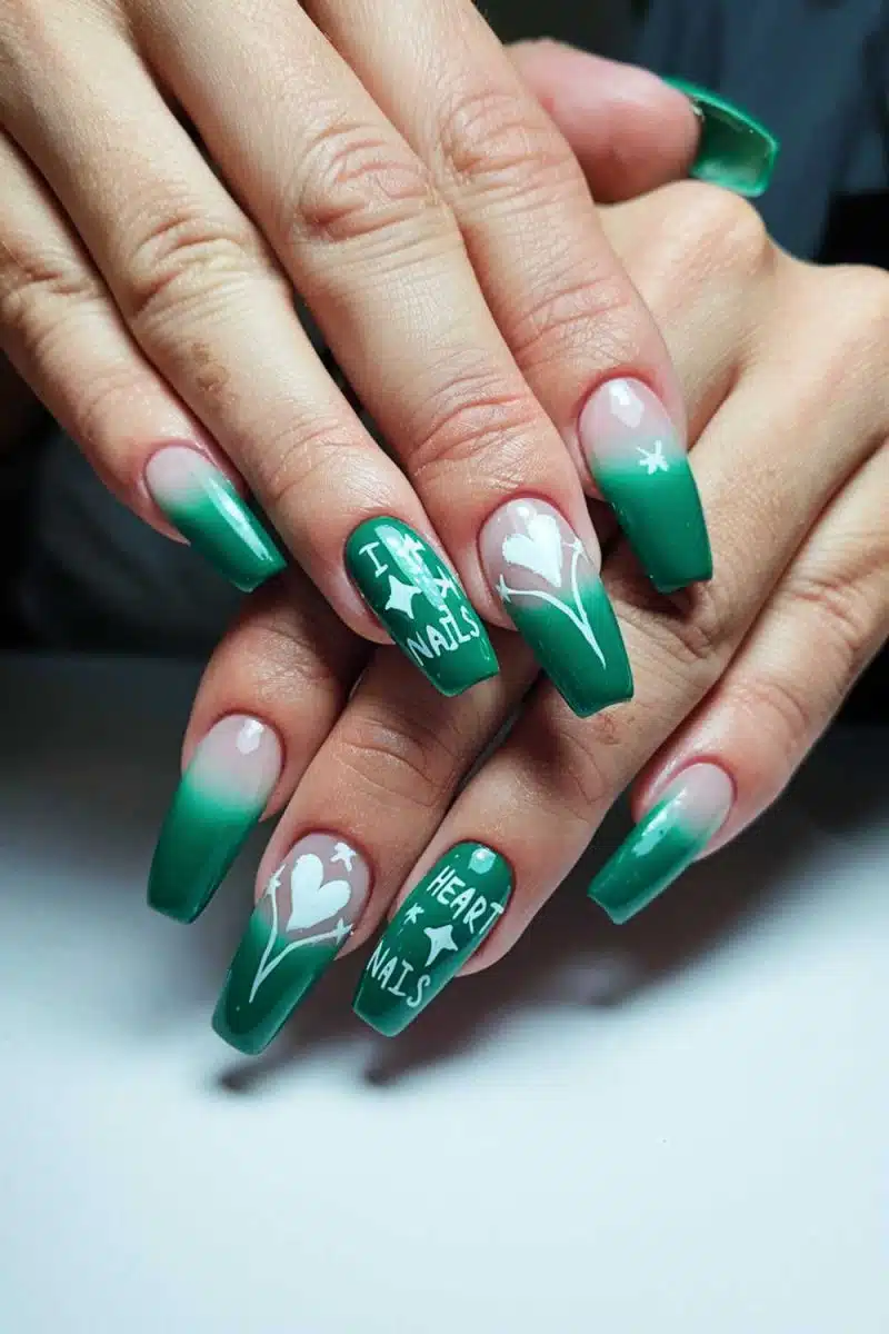 Got nails that scream I Heart Nails as much as this hand model. Those green ombre heart designs have me feeling like your hands just won prom queen.
