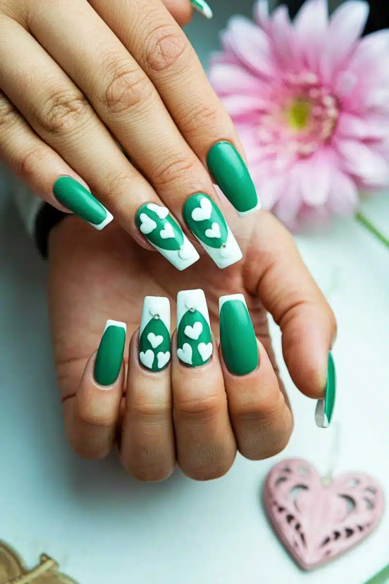 Nailed it! This heart-tastic manicure says love is in the air and on your nails. Holding that pink heart ornament just proves your home decor game is full of heart!.
