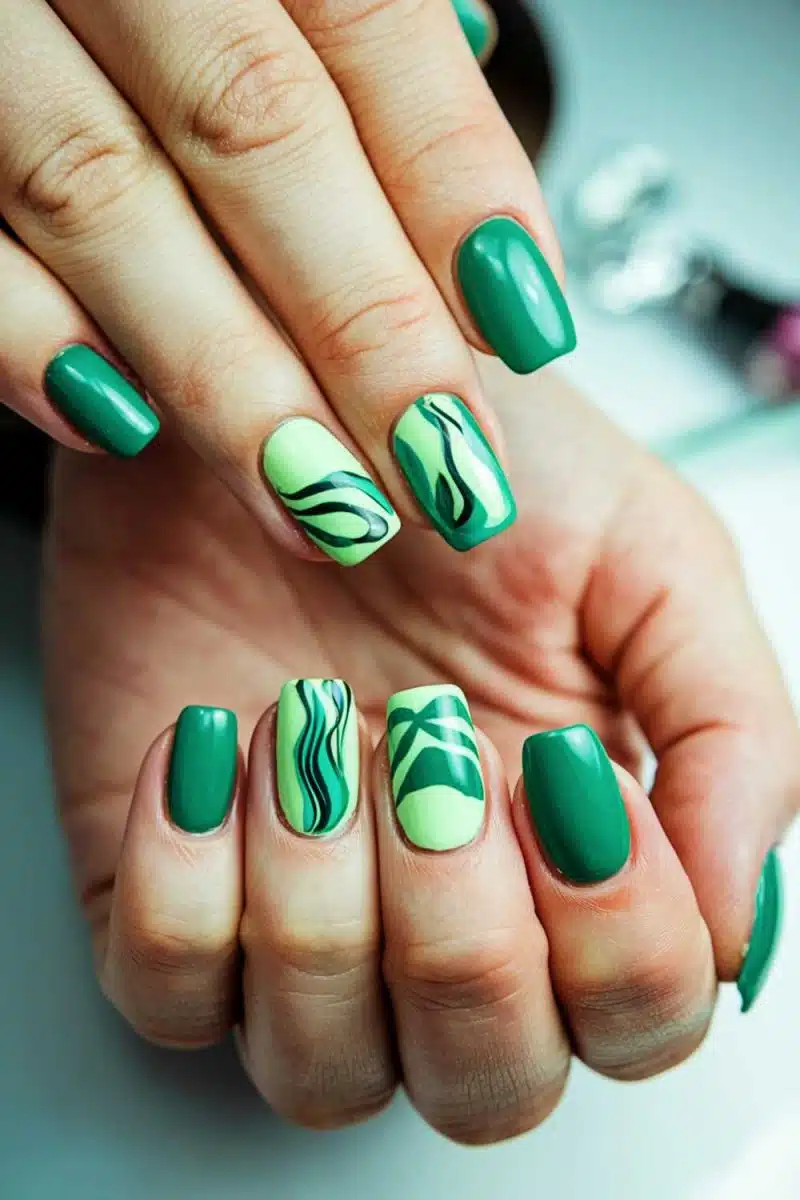 Your nails look like a trendy art exhibit in shades of green, proving that even your manicure has more depth than most dinner conversations.