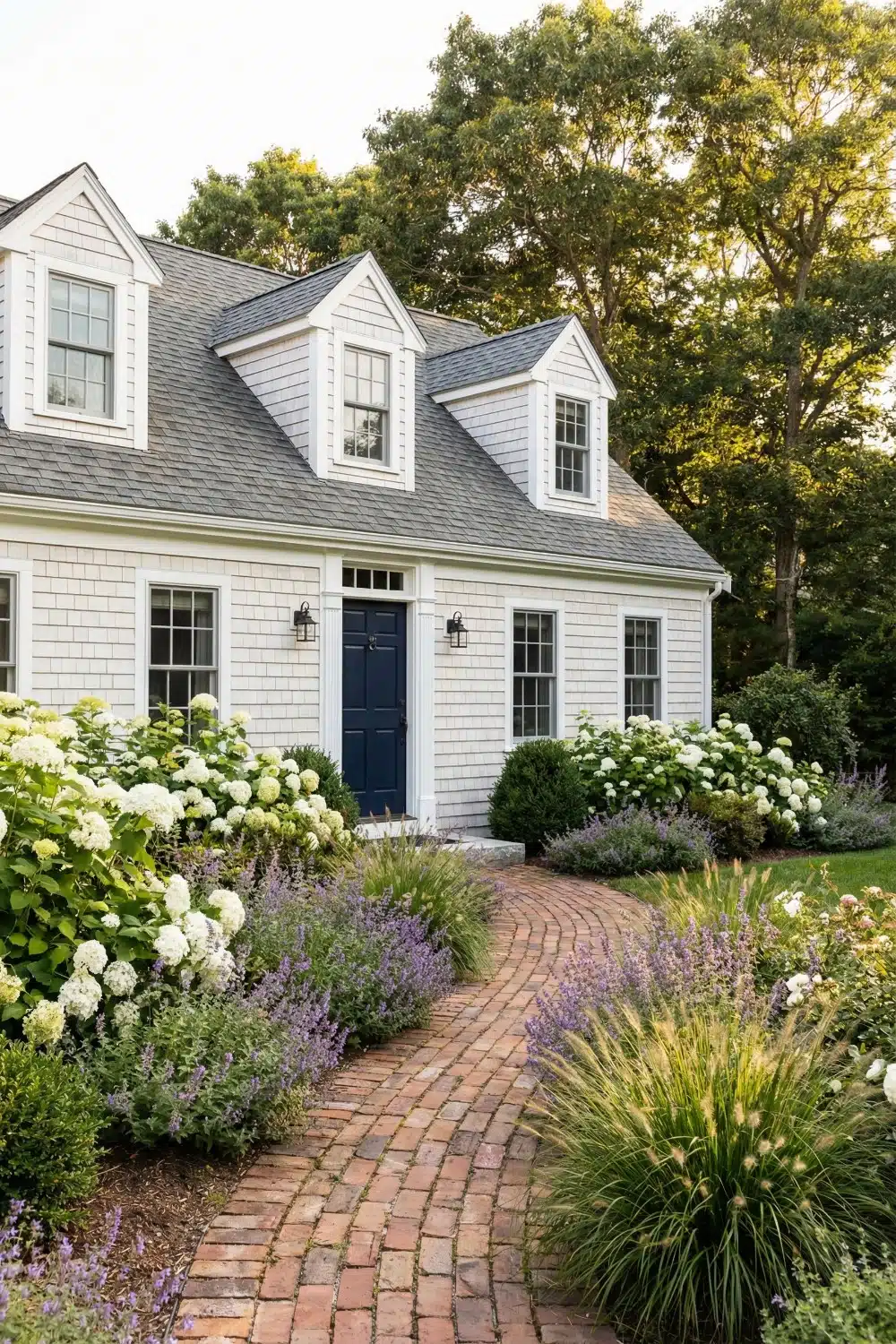 White Shingle Cape Cod House Exterior with Navy Door