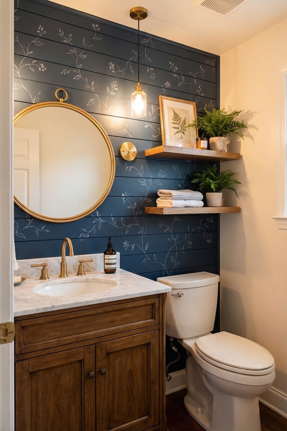 Stenciled vine navy small bathroom accent wall