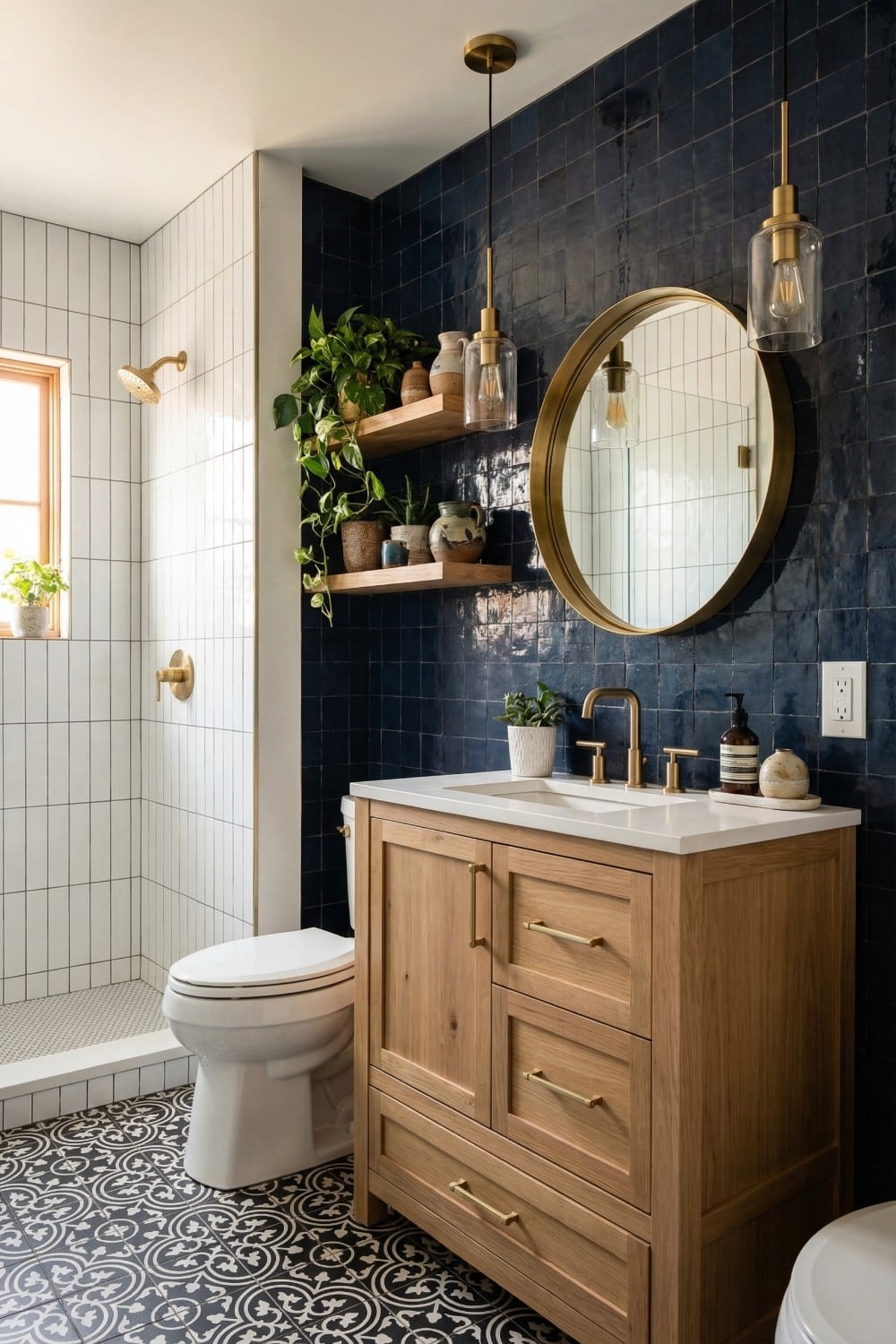 Navy blue small bathroom accent wall with gold mirror