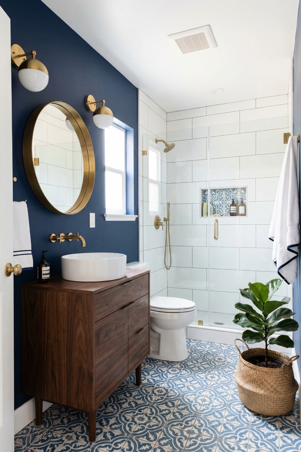 Mid-century walnut vanity and small bathroom accent wall